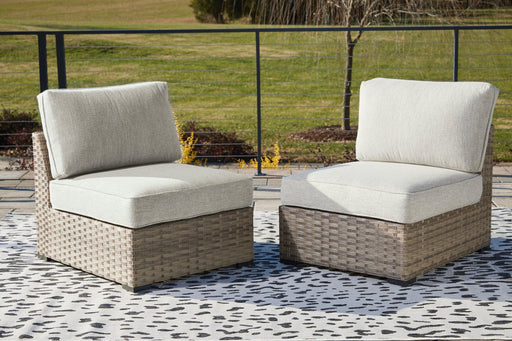 Calworth Outdoor Armless Chair with Cushion (Set of 2) - Holmwood's Furniture & Design Center (Somersworth, NH)