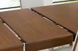 Lyncott Dining Extension Table - Holmwood's Furniture & Design Center (Somersworth, NH)