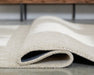 Wolbert 7'8" x 10' Area Rug - Holmwood's Furniture & Design Center (Somersworth, NH)
