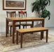 John Thomas Furniture Dining Essentials Bench in Cinnamon/Espresso - Holmwood's Furniture & Design Center (Somersworth, NH)