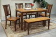 John Thomas Furniture Dining Essentials Bench in Cinnamon/Espresso - Holmwood's Furniture & Design Center (Somersworth, NH)